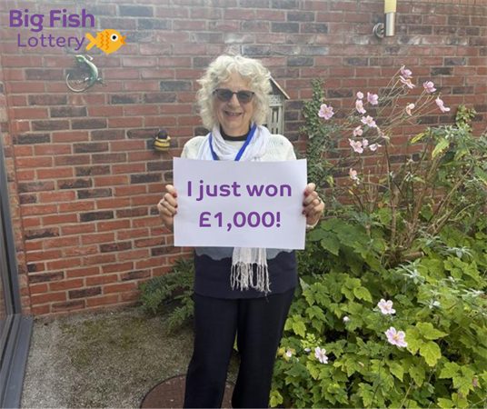 Big Fish Lottery player wins big by supporting local